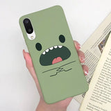 a person holding a book and a phone case