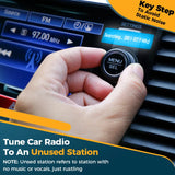 a person is pressing the button on a car radio