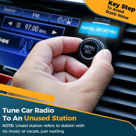 A person is pressing the button on a car radio