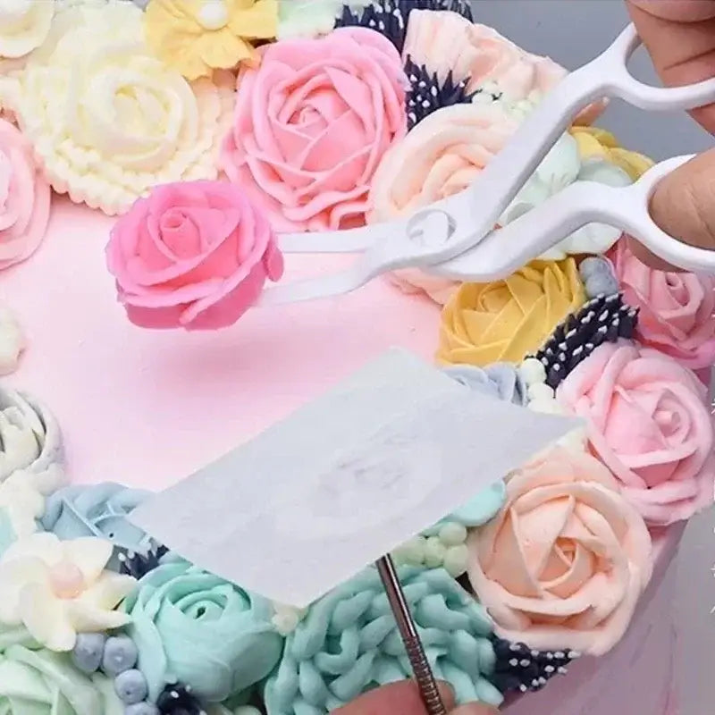 a person cutting into a cake with scissors