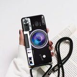 a person holding a camera case