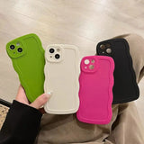 a person holding a cell case