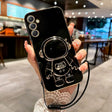 a person holding a cell phone with a camera attached to it
