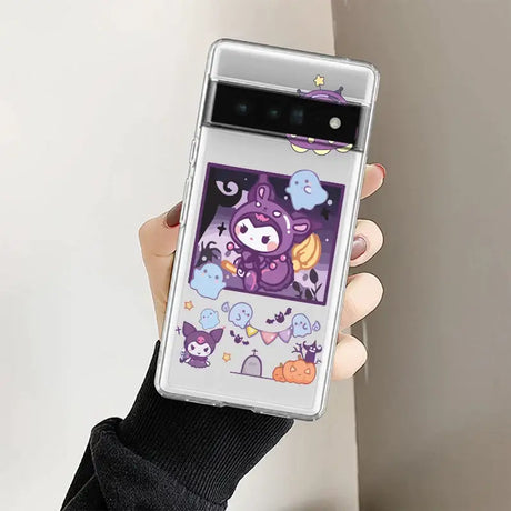 A person holding a cell phone with a cartoon design on it