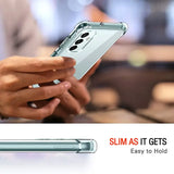 a person holding a cell phone in their hand