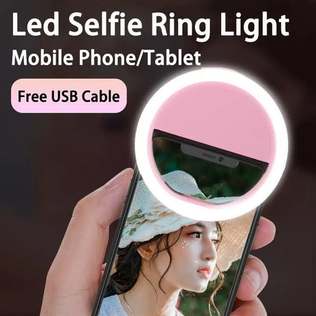 a person holding a cell phone with a light on it