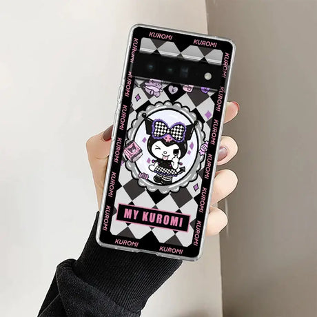 A person holding a cell phone with a skull on it