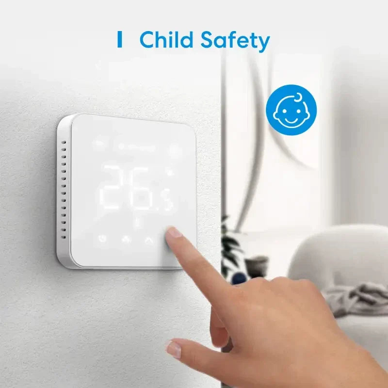 a person touching a child safety button on a wall
