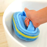 a person cleaning a bowl with a sponge