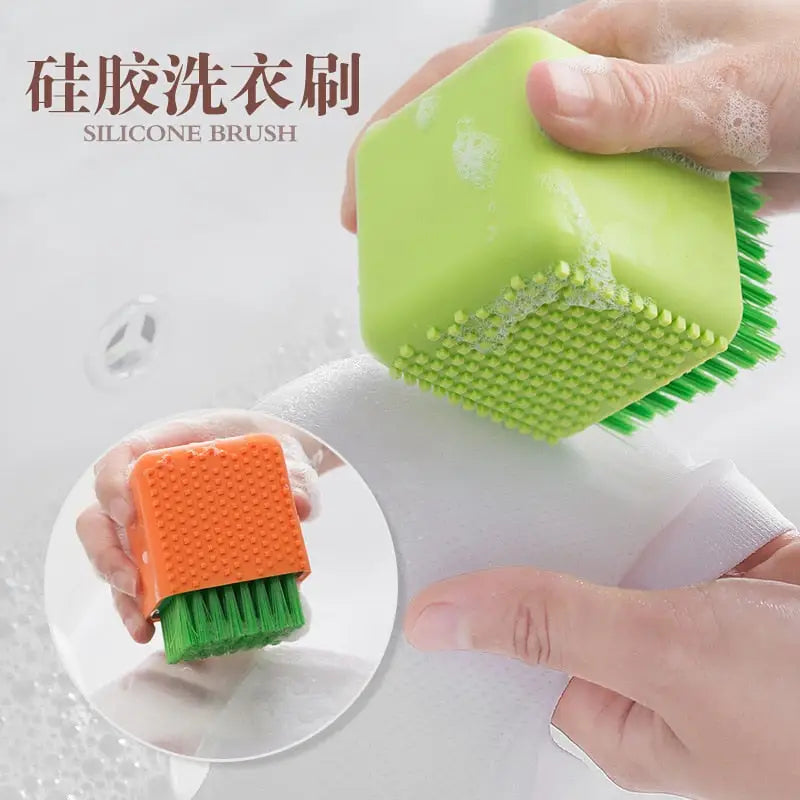 a person is cleaning a green and orange brush