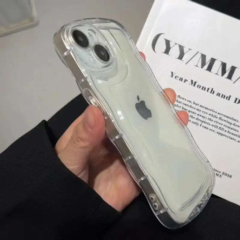 a person holding a clear case in their hand