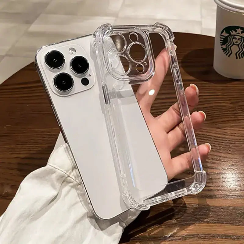 a person holding a clear case on a table