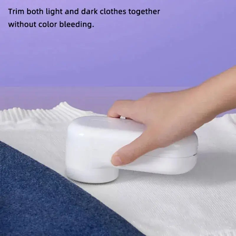 A person is putting a cloth onto a table