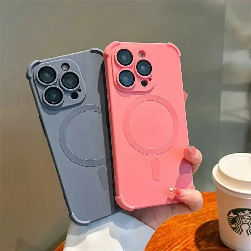 a person holding a cup and a phone case