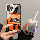 a person holding a drink and a phone case