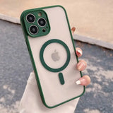 a person holding a green iphone case