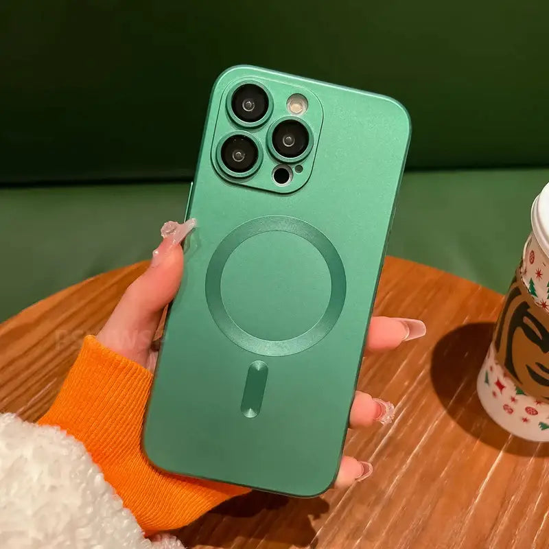 A person holding a green iphone case