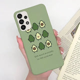 a person holding a green phone case with a green background
