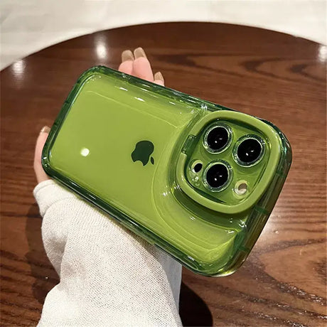 A person holding a green phone case