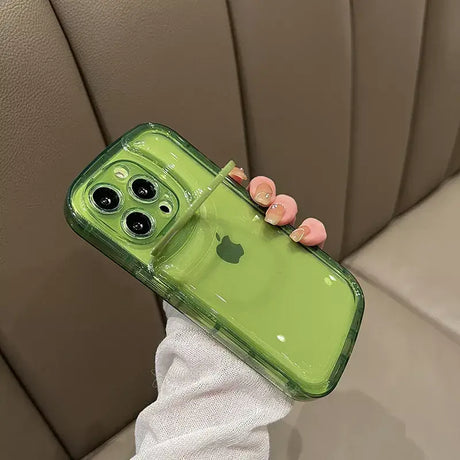 A person holding a green phone case