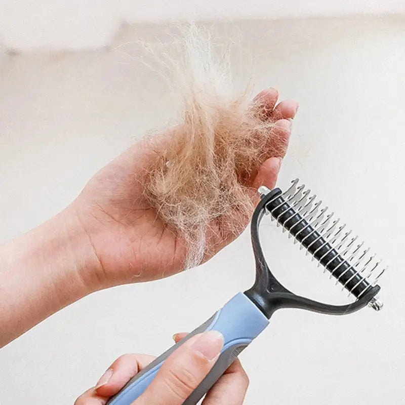 a person holding a hair brush and comb