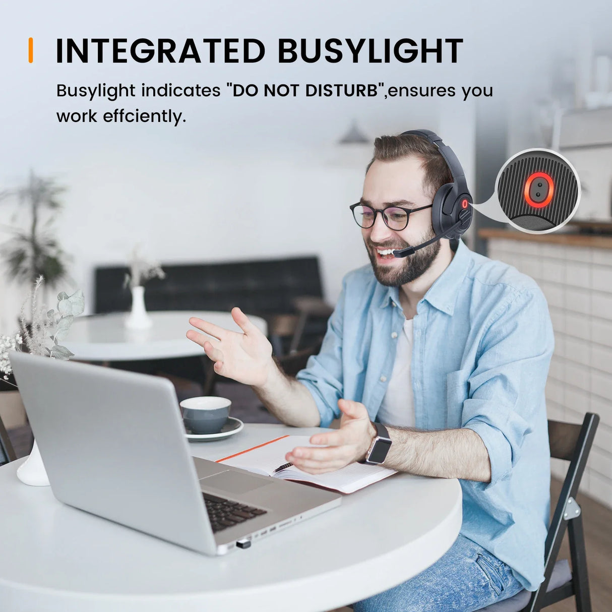 Person wearing headphones working at a laptop with an animated ’Busylight’ indicator overlay.