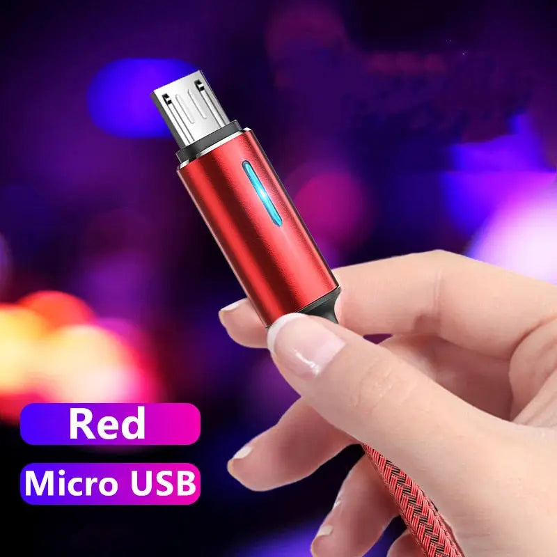 a hand holding a red usb usb device