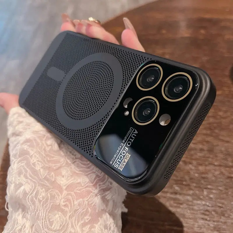 a woman holding a black iphone case with a bluetooth