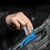 a person holding a blue plastic tool in their hand