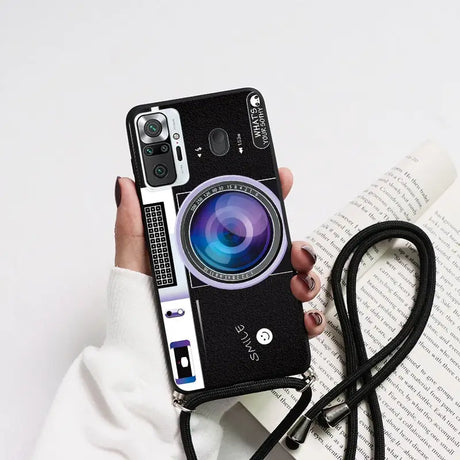 a person holding a camera case