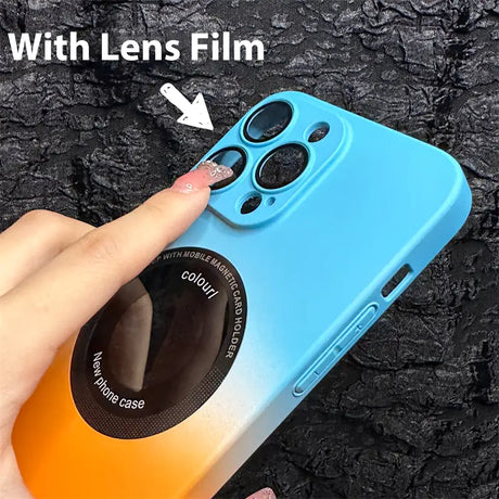 a hand holding a camera lens case