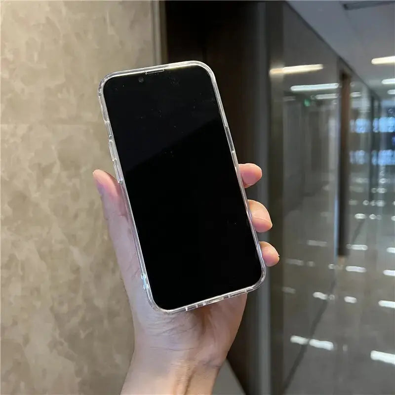 a person holding a cell phone in their hand