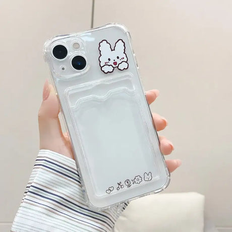 a person holding a phone case with a cartoon character on it