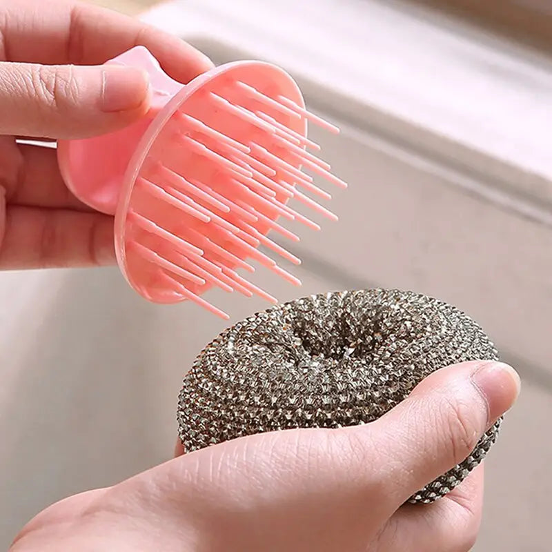 a person holding a comb with a hair brush