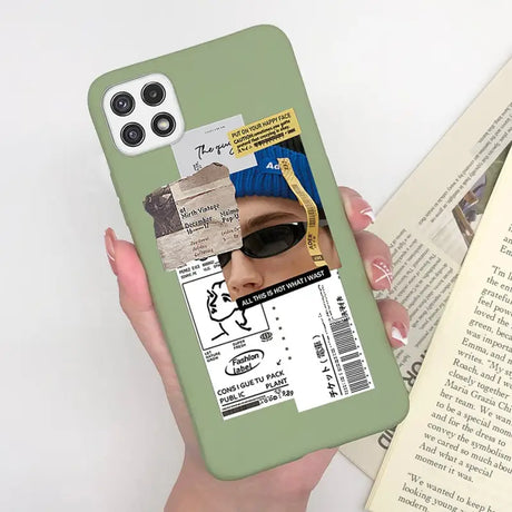 a person holding a book and a phone case