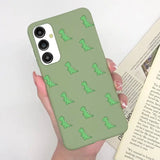 a woman holding a book and a green phone case