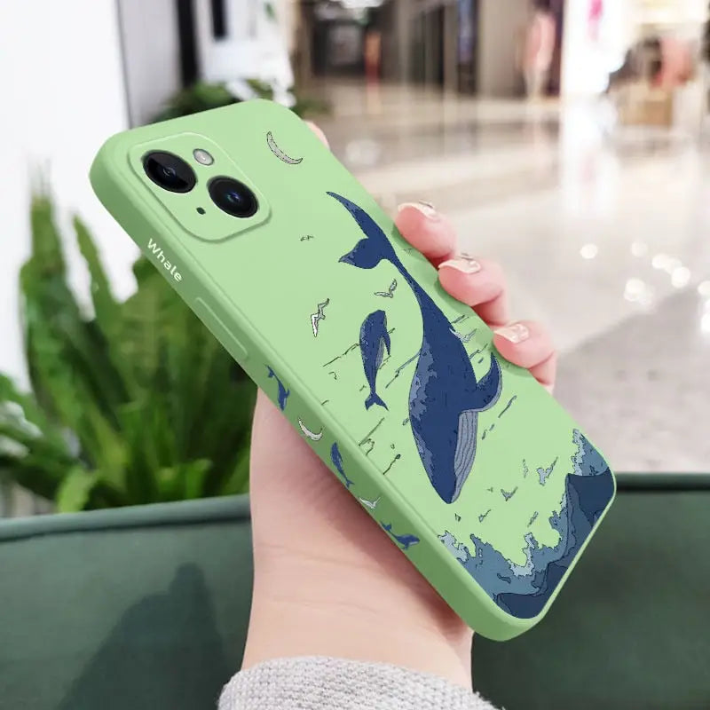 a person holding a green phone case with a map on it