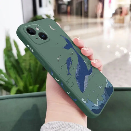 a person holding a green phone case with a map on it