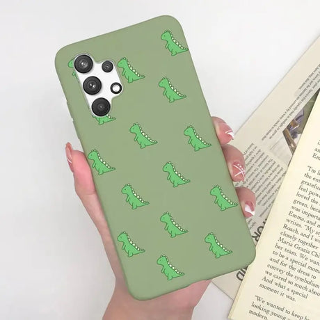 a person holding a book and a phone case