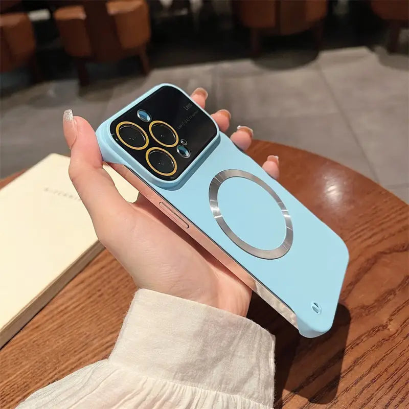 a person holding an iphone with a blue case