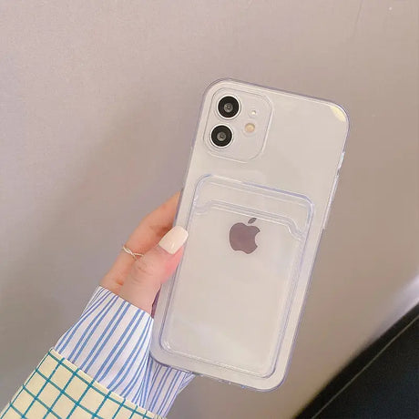 a person holding an iphone case in their hand