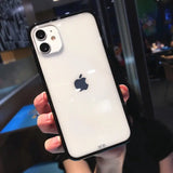 a person holding an iphone case in their hand