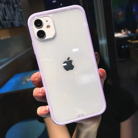 a person holding an iphone case in their hand