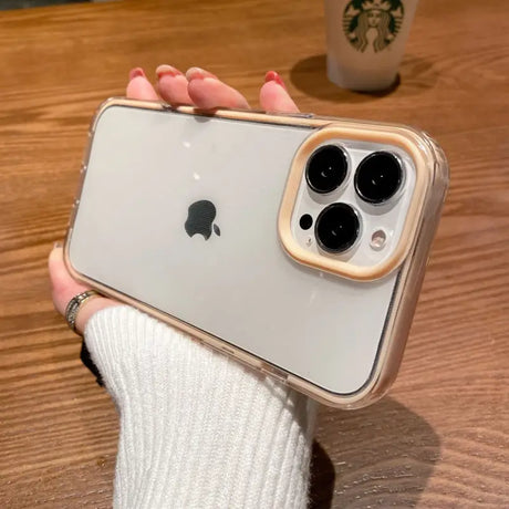 a person holding an iphone with their hands