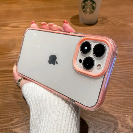 a woman holding a pink iphone case