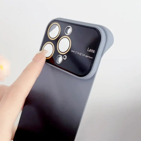 a person holding an iphone with a finger on it