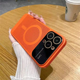 a person holding an orange iphone case