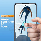 a person holding a phone with a finger on it