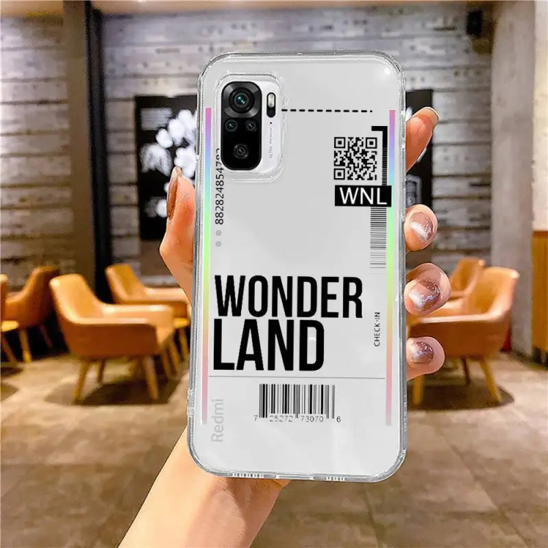 a hand holding a phone case with a barcode barcode on it
