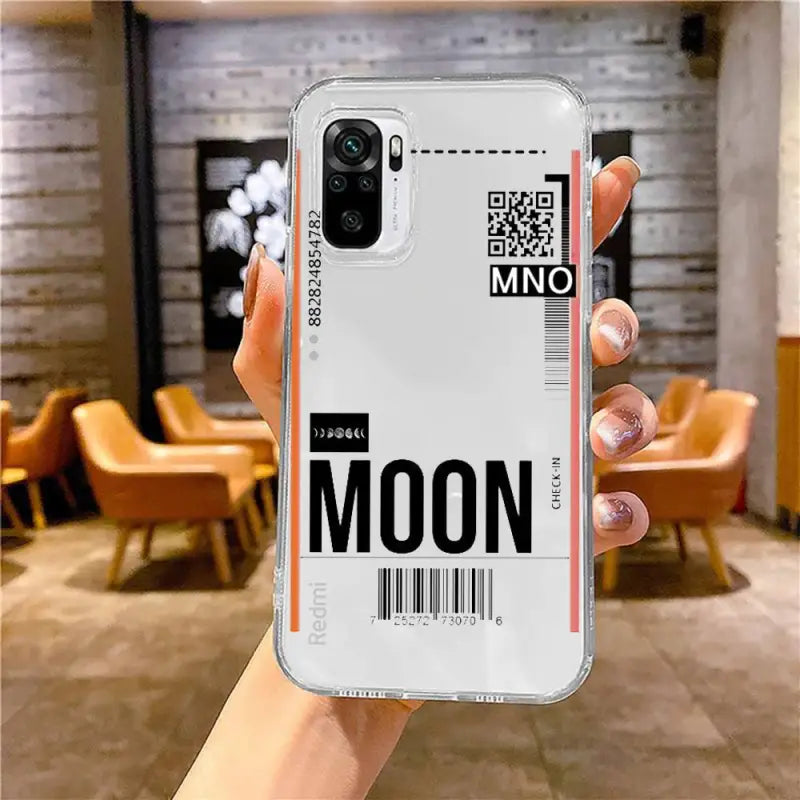 a person holding a phone case with the text’mom ’